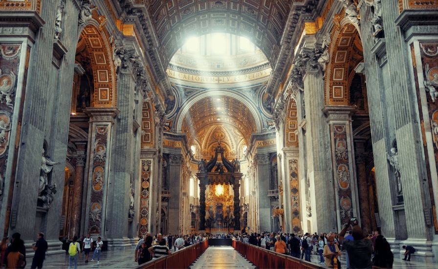 A magnificent Renaissance church in Vatican City, featuring a grand dome and intricate architectural details
