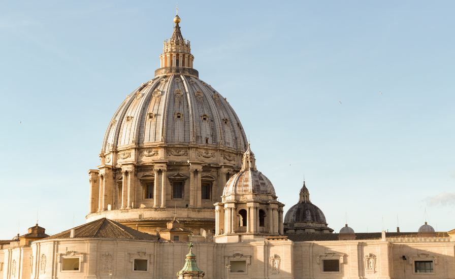 Exterior of St. Peter's Basilica in the Vatican, showcasing stunning architecture.