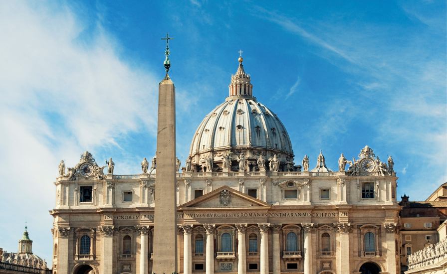 The Vatican, a stunning building with a tall obelisk, seen during the St. Peter Basilica dome tour
